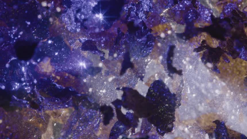 Extreme close up and a dense liquid with shiny abstract leaves