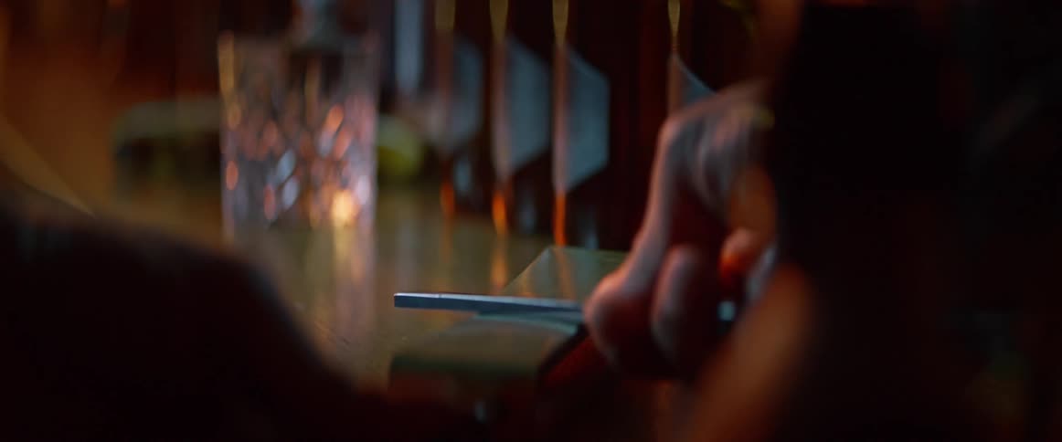 Hand of a person sharpening a razor