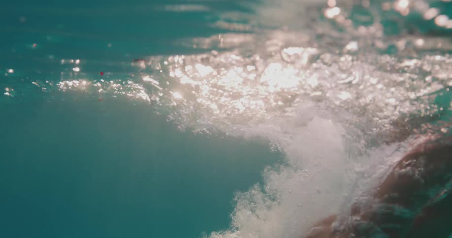 Woman diving in the ocean