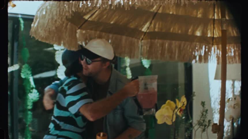 Two friends hug when meeting up outdoors