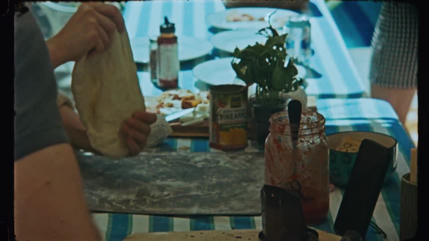 Womans hands preparing pizza dough