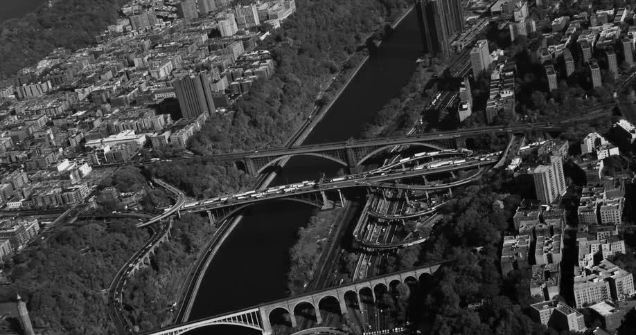 A citys river bridges in black and white