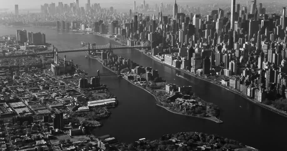 Aerial panorama of a metropolis with a sea canal in the middle