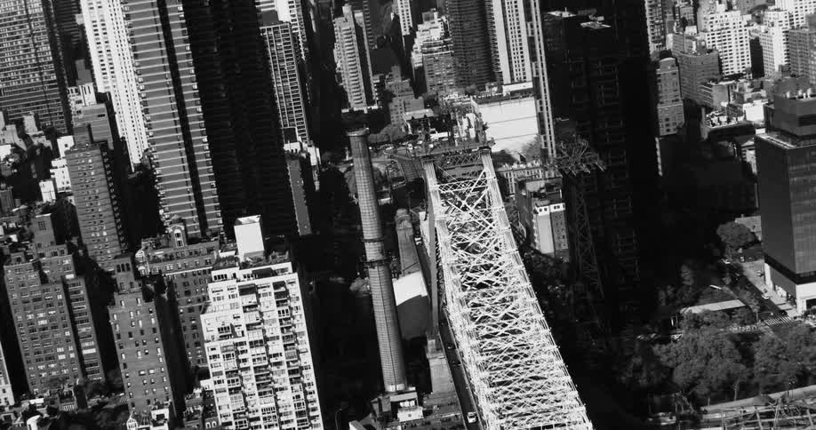 A large bridge leading into the downtown area of a city