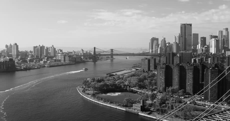 Aerial panorama and a metropolis with skyscraper on a sea canal in the middle