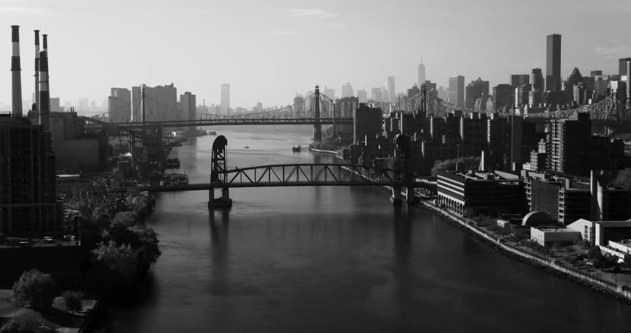 Panorama of a sea canal in a metropolis with skyscrapers and bridges