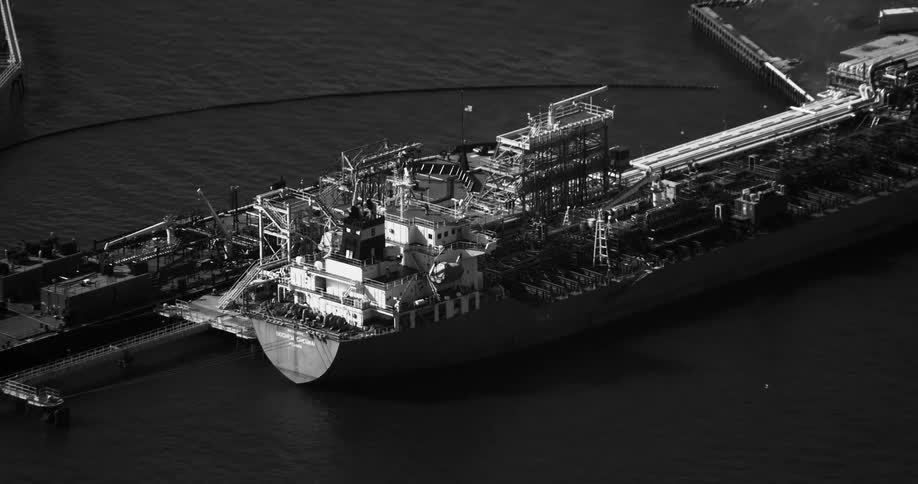 Aerial panorama of a cargo boat docked in a port