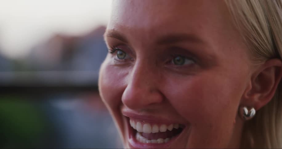 Portrait of a young blonde woman smiling