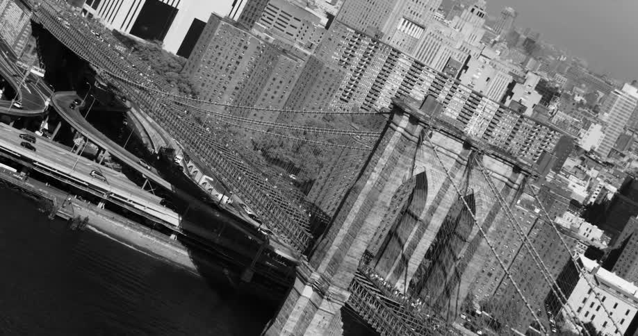 Heavy traffic travels over the bridge in the city