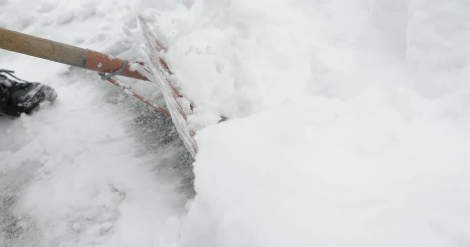 Snow is being shoveled