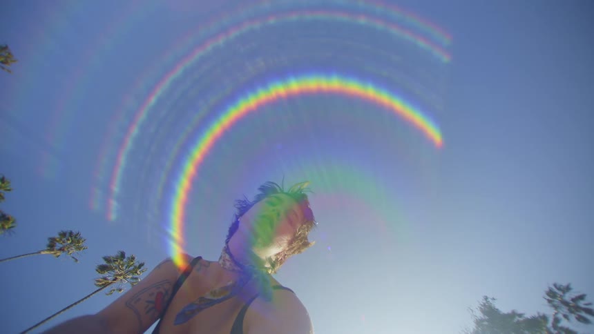 Portrait of a woman dancing in an outdoor space