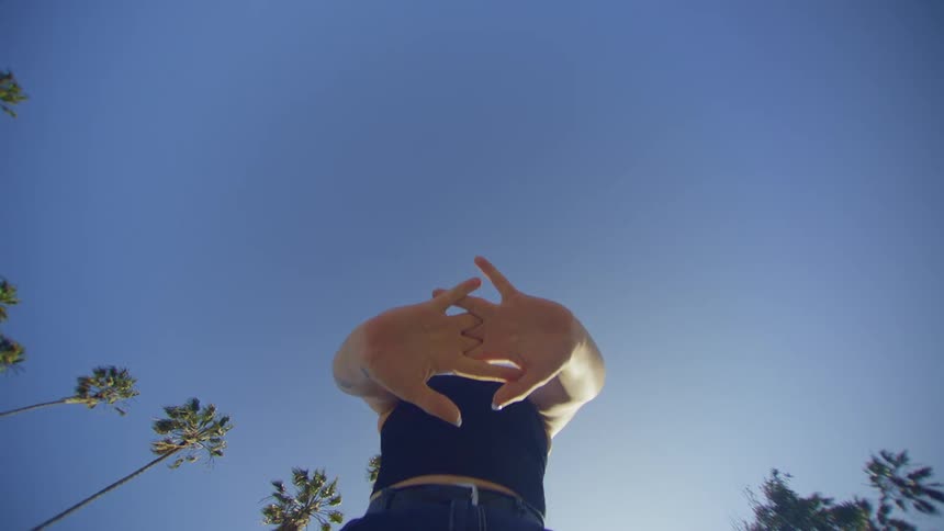 Portrait of a woman dancing outdoors