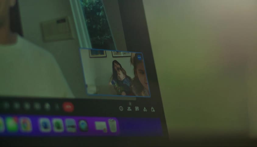 People are having a video call on the laptop