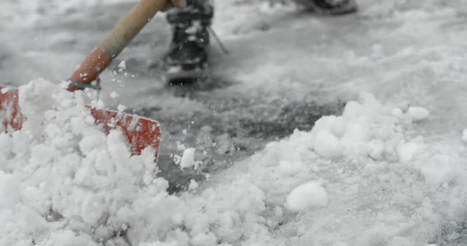 Person shoveling snow