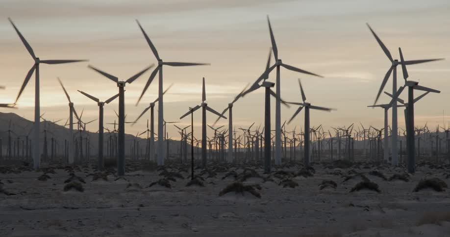 Wind turbines spin in the desert