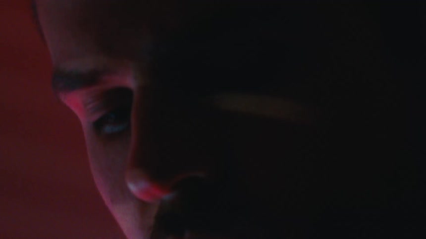 Aman looks around in the dark room