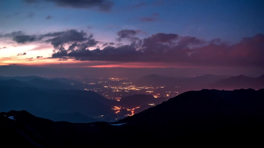 Silhouette landscape of mountains and the day getting dark