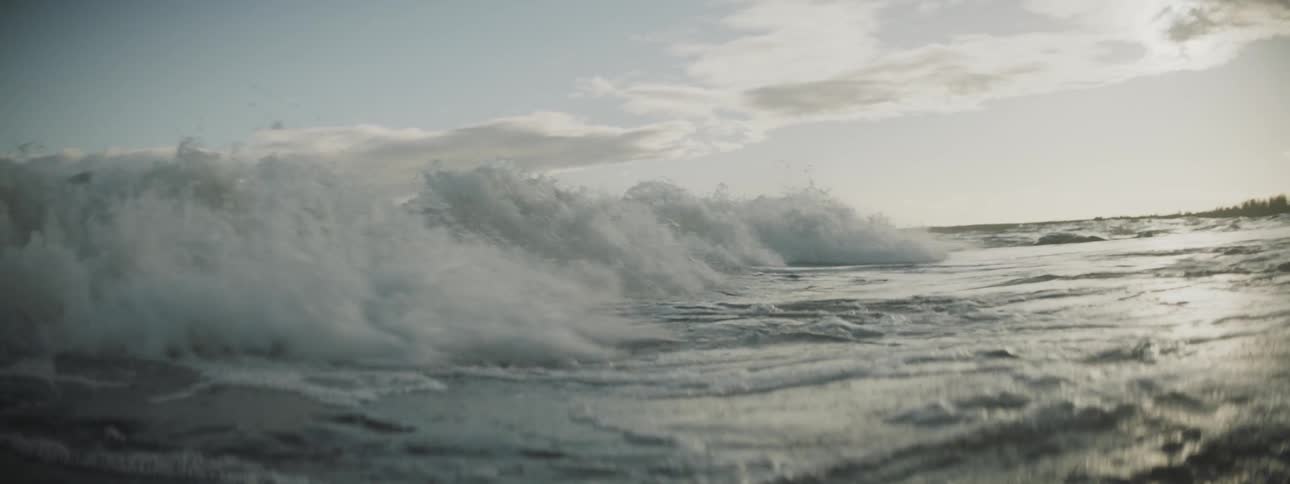 Ocean waves wash towards the shore
