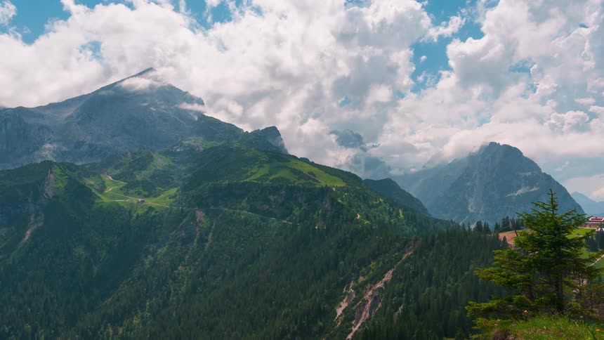 Scenery of mountain ranges and clouds passing by in timelapse