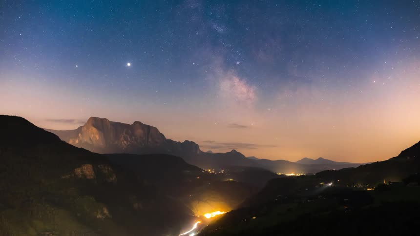 Cars drive on the mountain roads all day and night