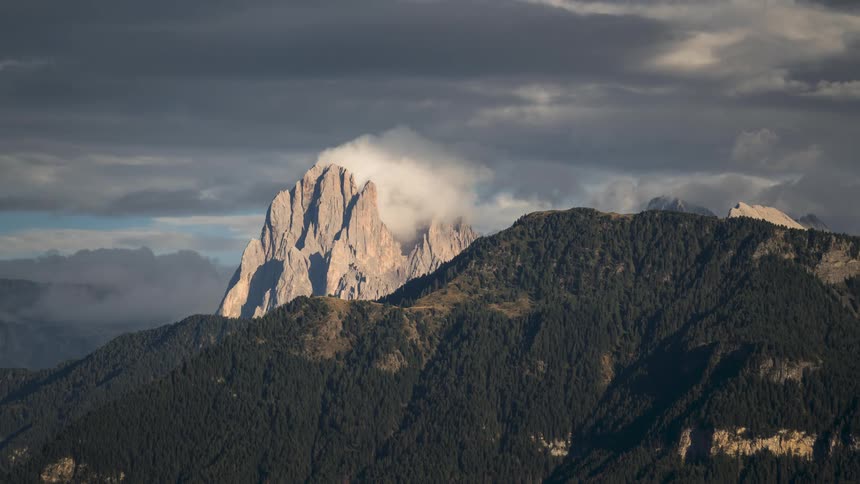 Clouds touch the top of the mountain