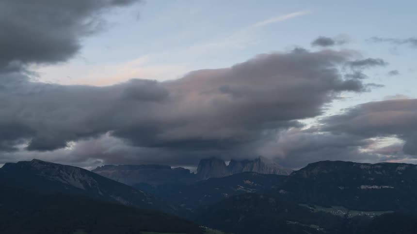 Scenery of hills and mountain ranges with the day getting dark