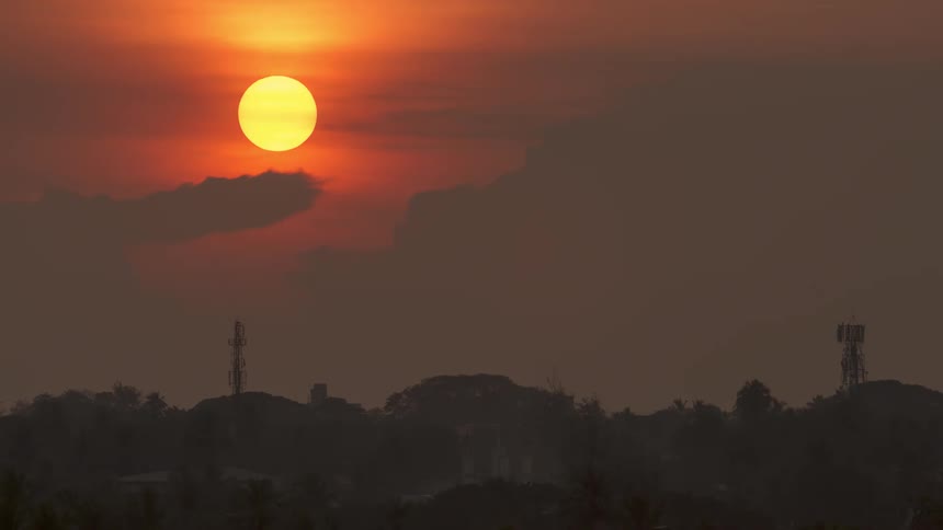 Mountain landscape and the setting sun