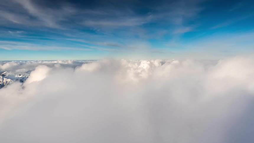 Heavy clouds are above the mountains