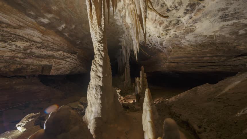 Interior of a cave with stalactites and stalagmites