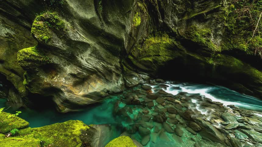 The stream runs through the cavern