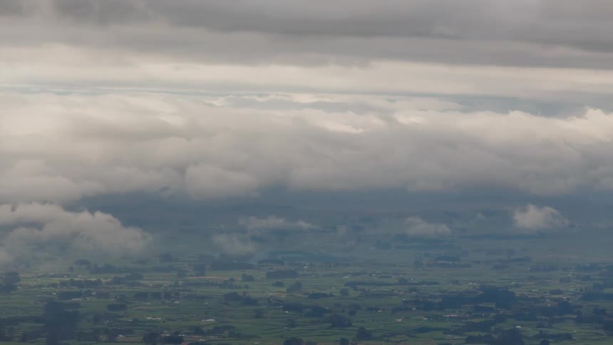 Natural landscape with dense clouds passing by