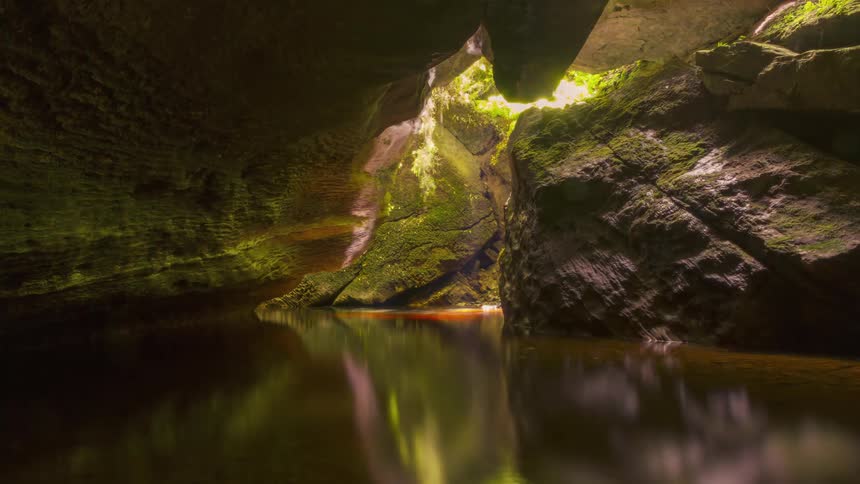 Lake in the middle of a cave with solar reflection