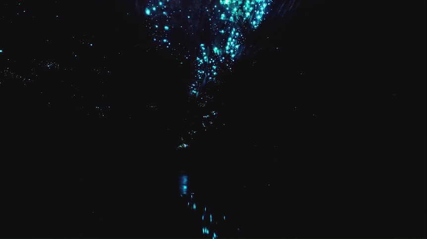 Closeup on a rock with shiny blue crystals