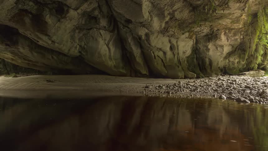 A stream runs under the cavern