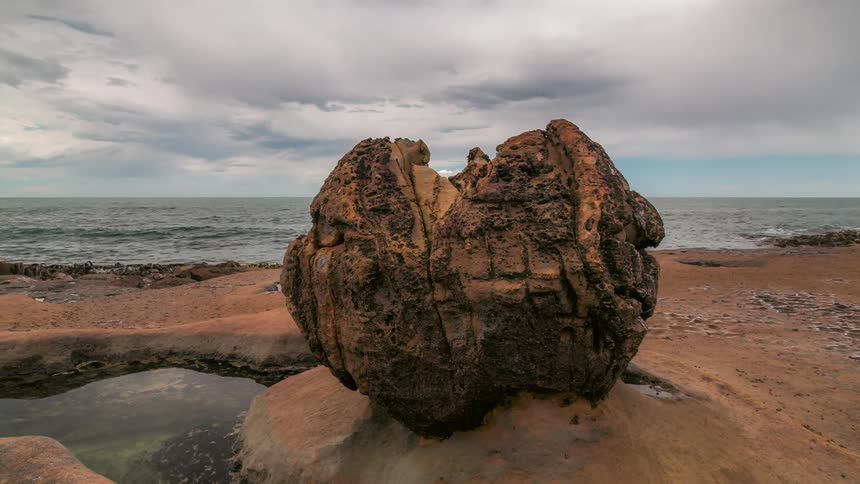 Aerial panorama of an eroded rock by the sea