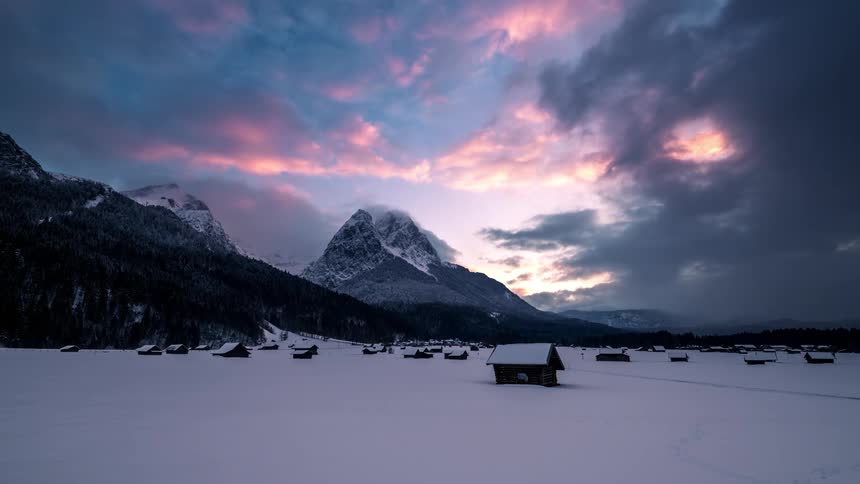 Small homes are near the mountains