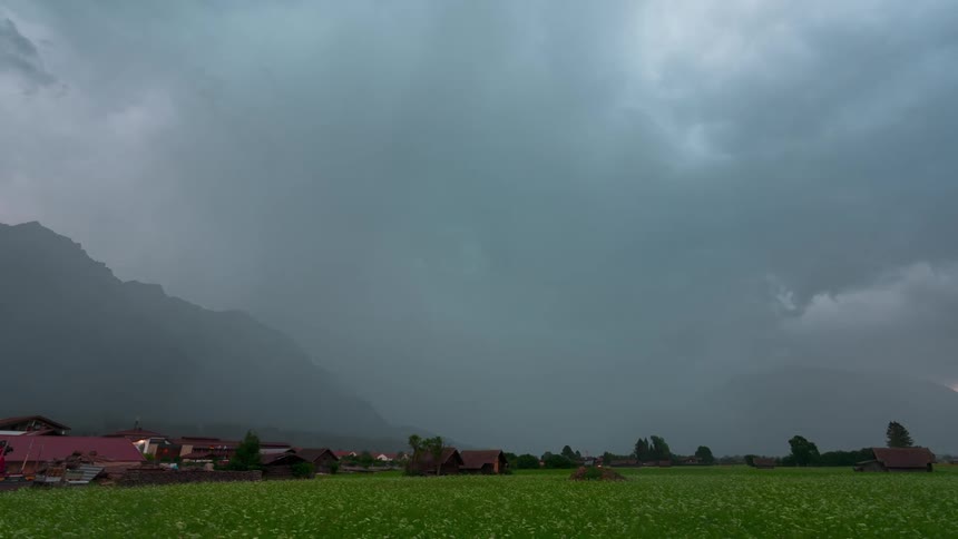 Huge storm clouds cover the rural town