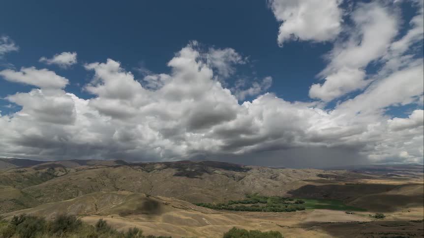 Panorama of mountains and clouds passing by in timelapse