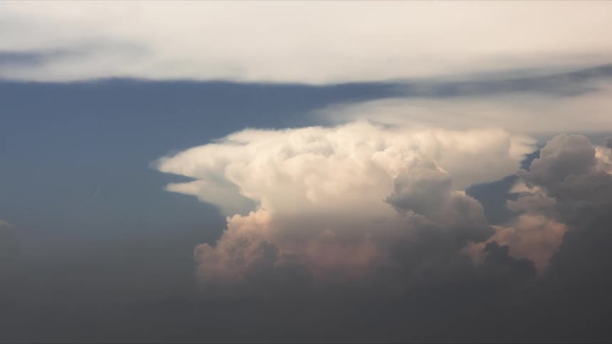 White and dark clouds form and disperse in the sky