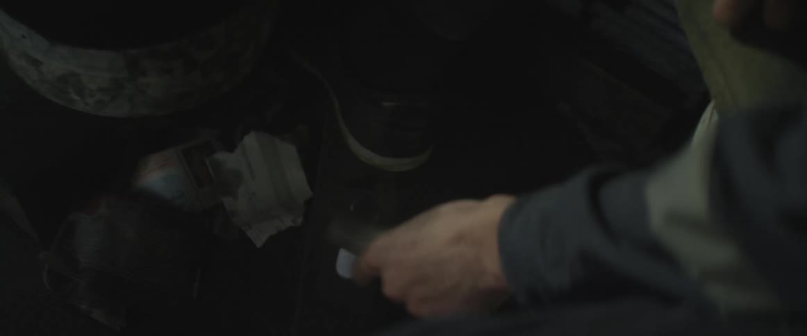 Man scoops coffee into a coffee pot