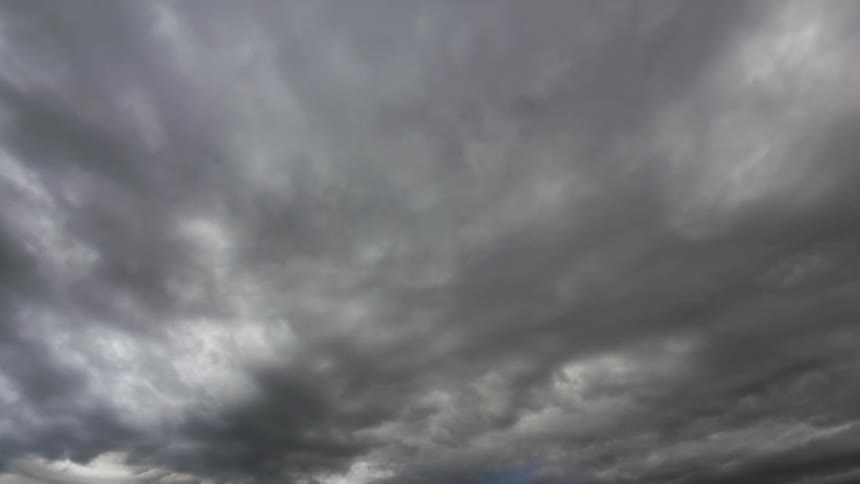 Dark storm clouds passes the sky