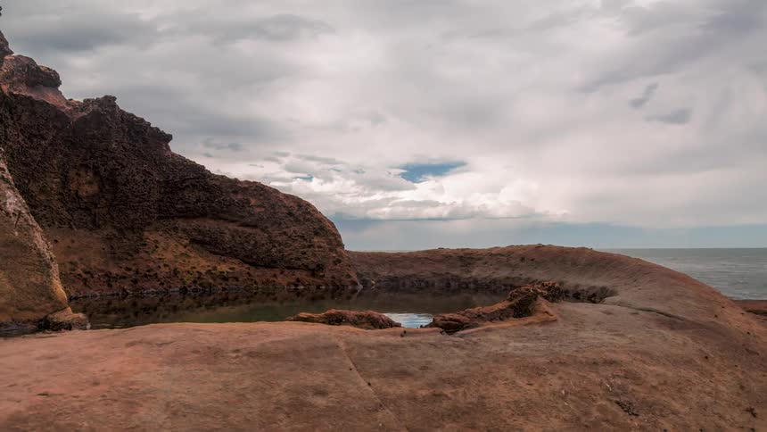 Natural rock formation with a perfectly circular saltwater pool