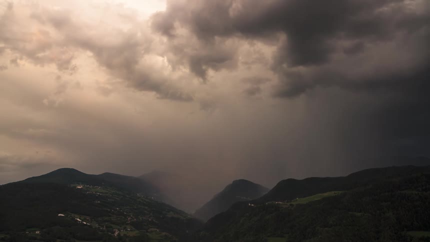 Greenish mountain ranges on a cloudy day