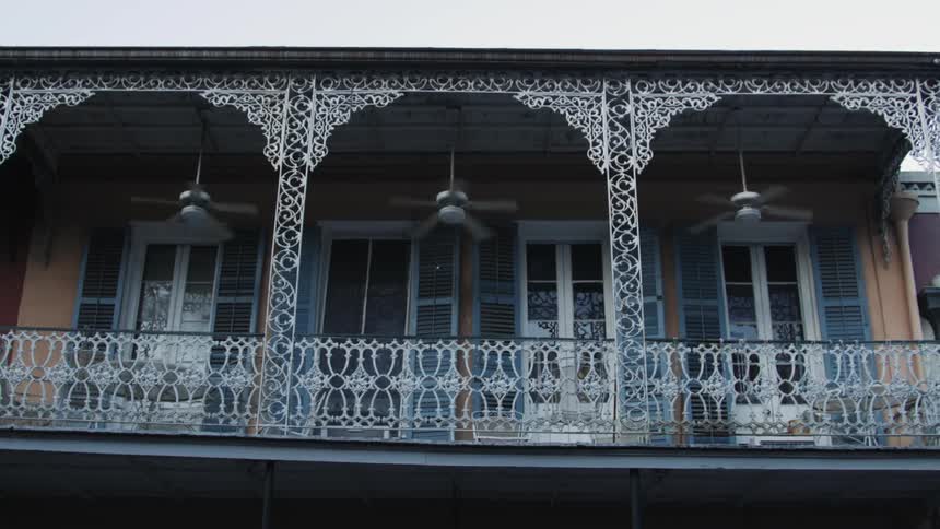 Hanging porch fans spin rapidly