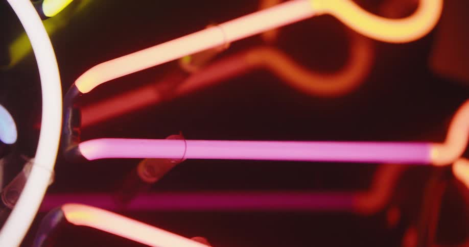 A neon sign hanging inside of a room