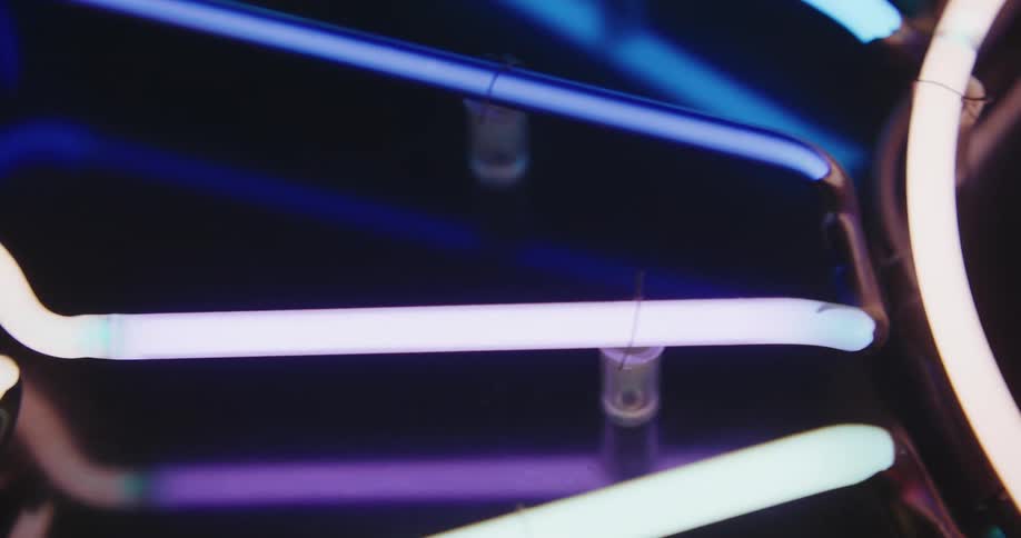 Panel on a wall with lit neon lights