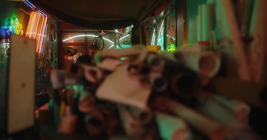 A worker walks through the shop