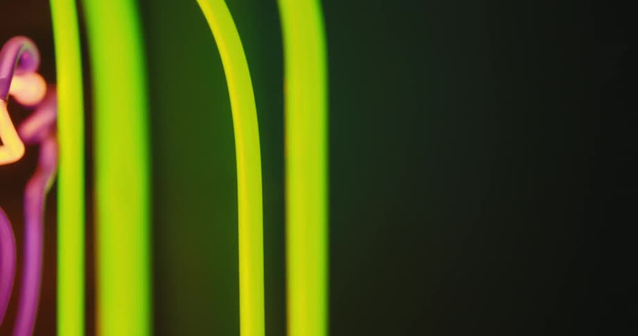 Neon panel illuminated on a dark wall