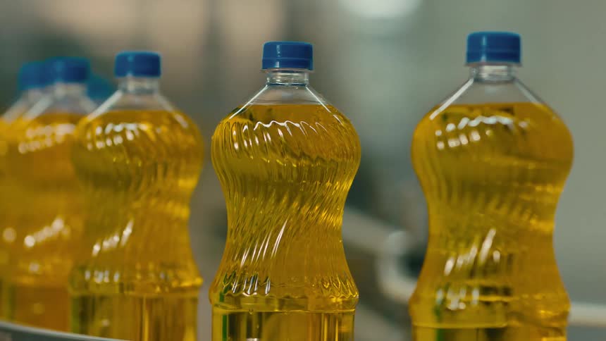 A clip of a manufacturing process of drinks in a bottle