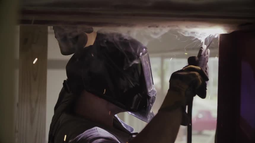 A person is welding